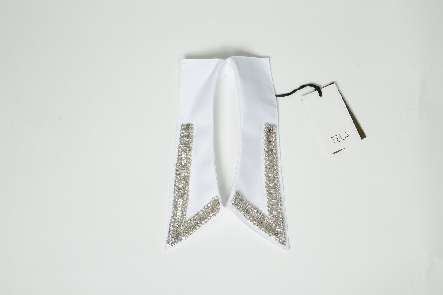 https://admin.shopify.com/store/gulieshop/products/15576519410013#:~:text=https%3A//www.gulieshop.it%20%E2%80%BA%20products%20%E2%80%BA%20tela%2Dcolletto%2Dcon%2Dstrass%2Dleis