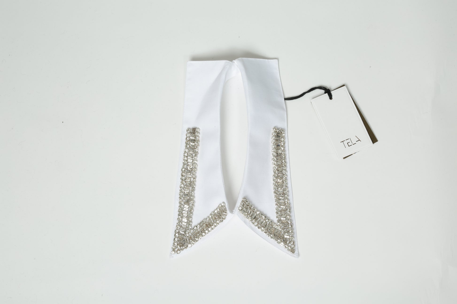 https://admin.shopify.com/store/gulieshop/products/15576519410013#:~:text=https%3A//www.gulieshop.it%20%E2%80%BA%20products%20%E2%80%BA%20tela%2Dcolletto%2Dcon%2Dstrass%2Dleis