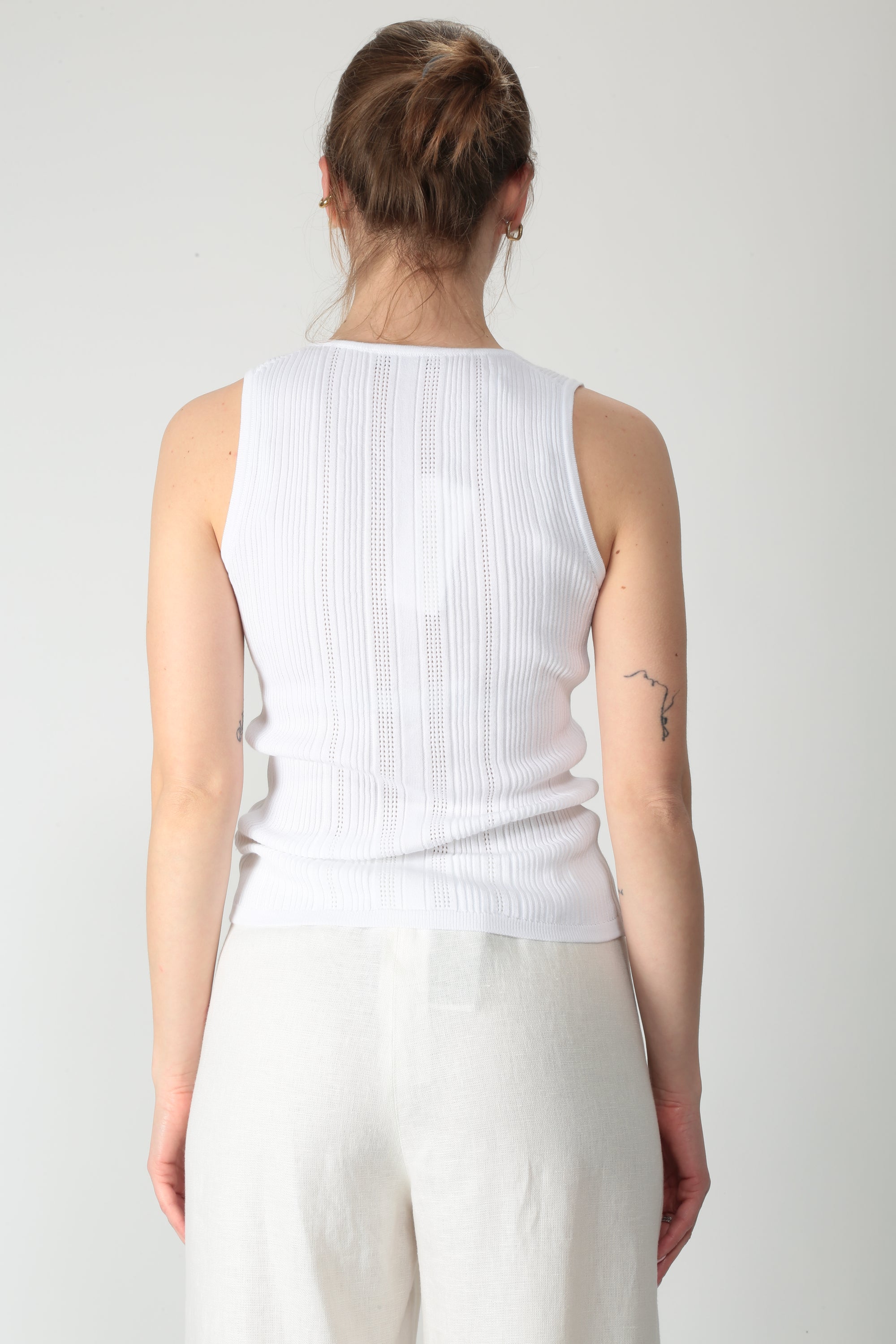 https://admin.shopify.com/store/gulieshop/products/16028295922013#:~:text=https%3A//www.gulieshop.it%20%E2%80%BA%20products%20%E2%80%BA%20purotatto%2Dtop%2Da%2Dcoste%2Dcon%2Dbottoni%2Dss260742308
