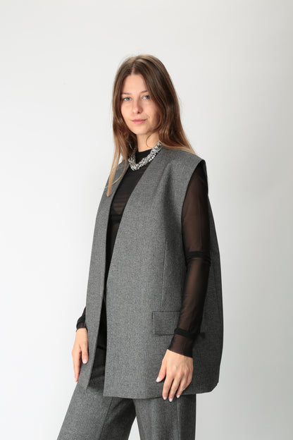 https://admin.shopify.com/store/gulieshop/products/15621933990237#:~:text=https%3A//www.gulieshop.it%20%E2%80%BA%20products%20%E2%80%BA%201978%2Dgilet%2Doversize%2Dgrisaglia