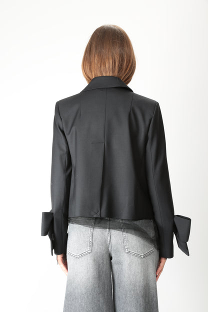 https://www.gulieshop.it › products › meimeij-giacca-cropped-con-fiocchi-m5ih09