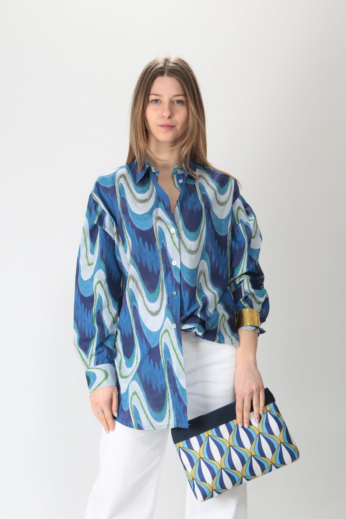 https://admin.shopify.com/store/gulieshop/products/9113094717789#:~:text=Invia-,Maliparmi%20Borsa%20a%20mano%20plouch%20Fortuna%20print%20OP009060139B,-Contenuto%20multimediale%201