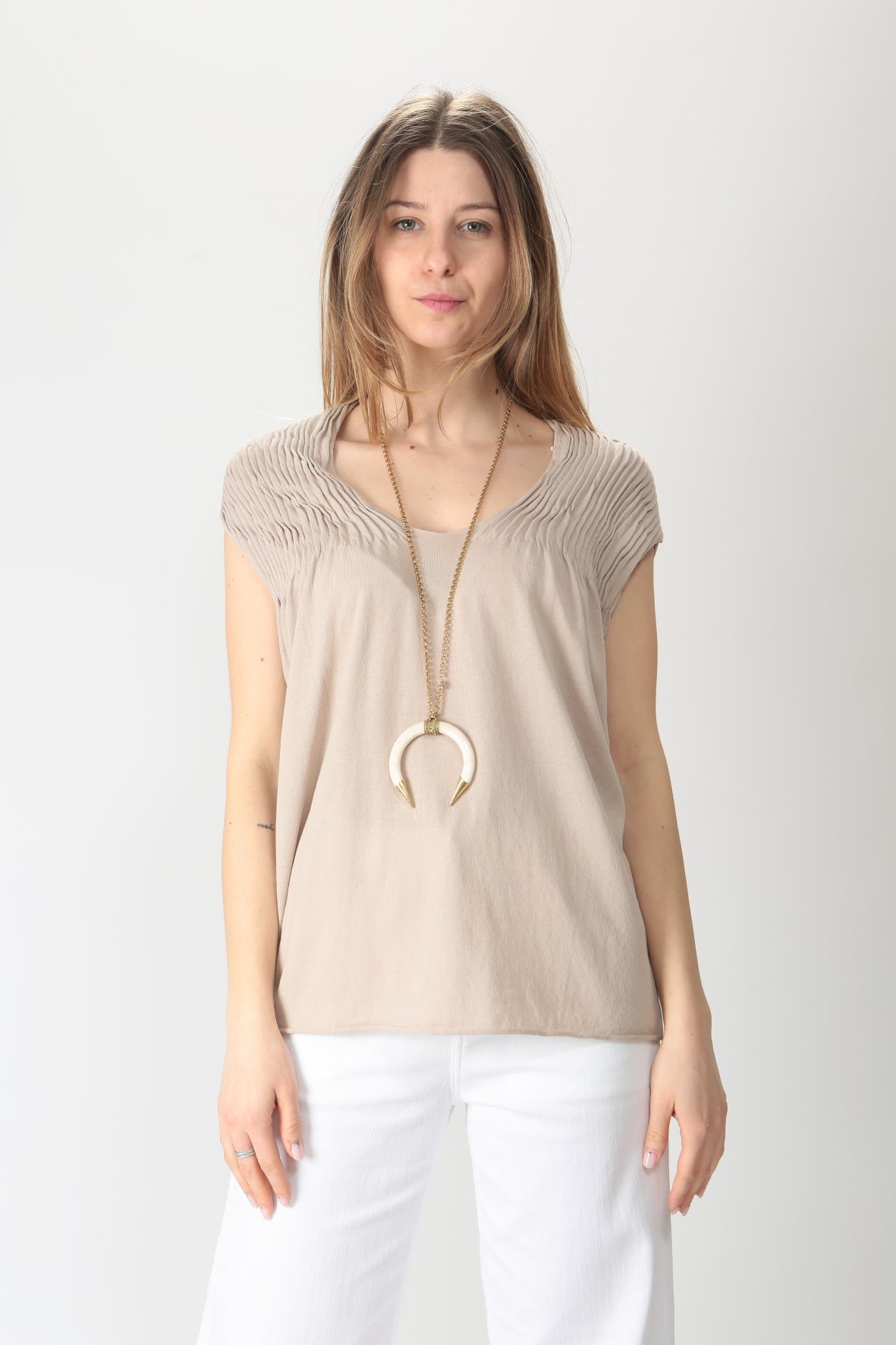 https://admin.shopify.com/store/gulieshop/products/9114796851549#:~:text=Invia-,Kangra%20Top%20smanicato%20con%20arriccio%208915%2077,-Contenuto%20multimediale%201