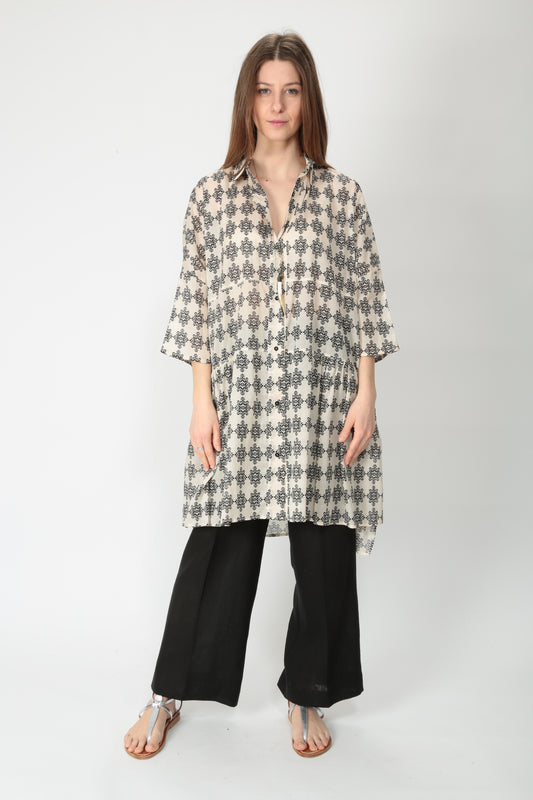 https://admin.shopify.com/store/gulieshop/products/15154427134301#:~:text=https%3A//www.gulieshop.it%20%E2%80%BA%20products%20%E2%80%BA%201978%2Dabito%2Da%2Dchemisier%2Dcorto%2Descape