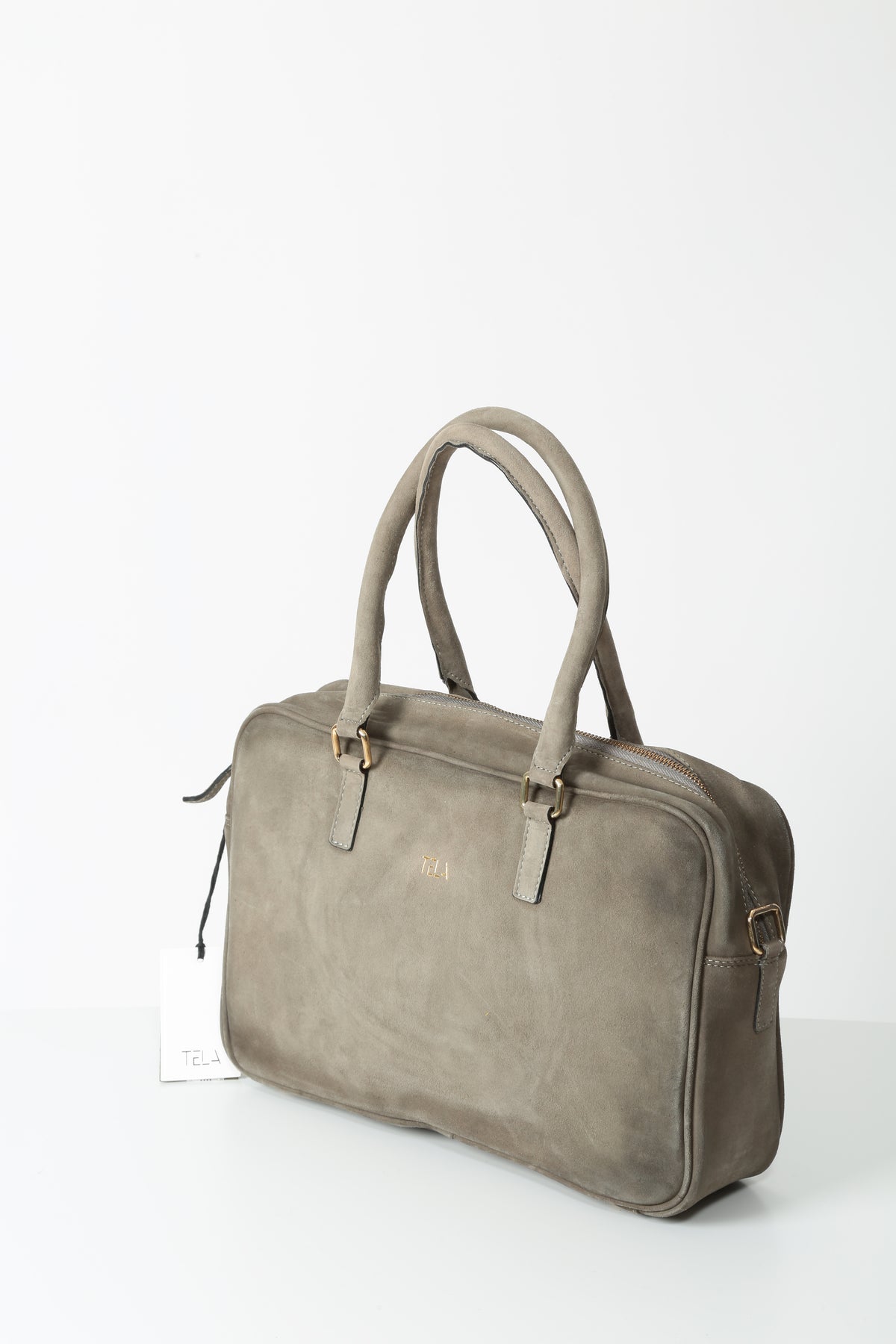 https://admin.shopify.com/store/gulieshop/products/16596164116829#:~:text=https%3A//www.gulieshop.it%20%E2%80%BA%20products%20%E2%80%BA%20tela%2Dborsa%2Din%2Dsuede%2Dtamigi