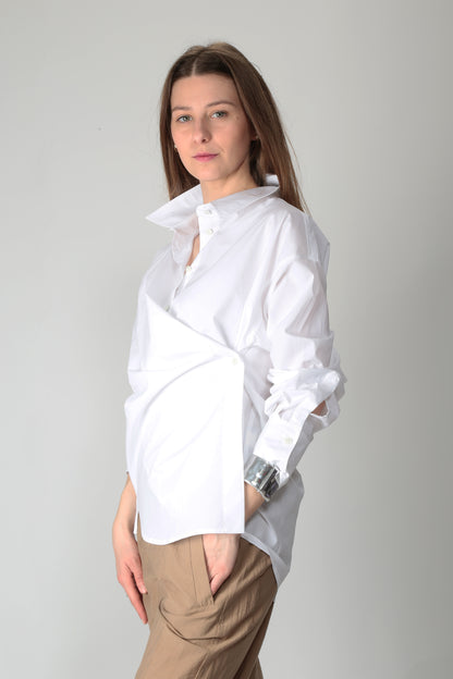 https://admin.shopify.com/store/gulieshop/products/15250588893533#:~:text=https%3A//www.gulieshop.it%20%E2%80%BA%20products%20%E2%80%BA%20r%2Dcollina%2Dcamicia%2Dasimmetrica%2Din%2Dcotone%2Db51205