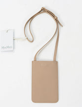 https://admin.shopify.com/store/gulieshop/products/8021719220462#:~:text=Invia-,MaxMara%20Leisure%20Porta%20smartphone%20Belluno,-Contenuto%20multimediale%201